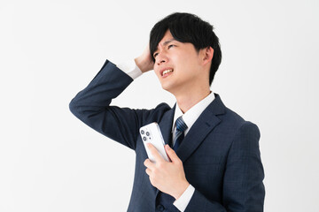 ビジネススーツを着ている若い男性　ビジネスイメージ