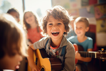 young children playing guitar in classroom - obrazy, fototapety, plakaty