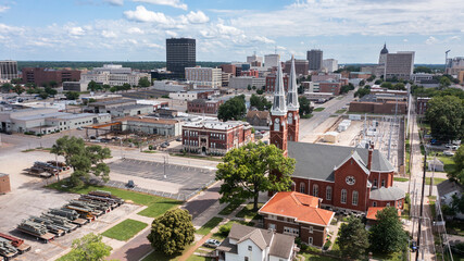 Naklejka premium View of a historic church and buildings in downtown Topeka, Kansas, USA.