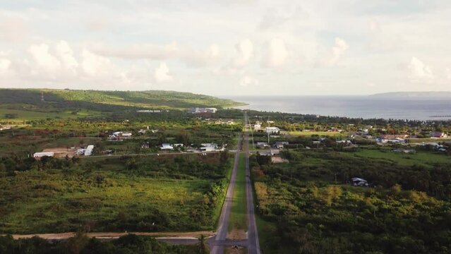 Tilt up shot of Broadway road at Tinian, Northern Mariana Islands