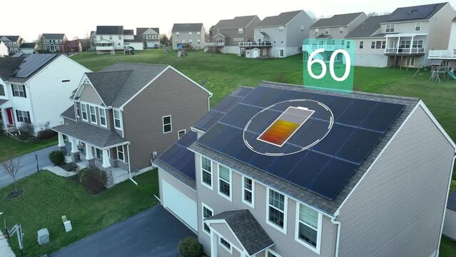 Rooftop solar panel array on American home. Motion graphic illustration, green renewable energy refuels battery cell icon animation. Aerial in modern USA neighborhood.