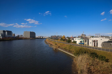 Fototapeta premium Nov 30 2023 City skyline at dawn with blue sky and water reflection