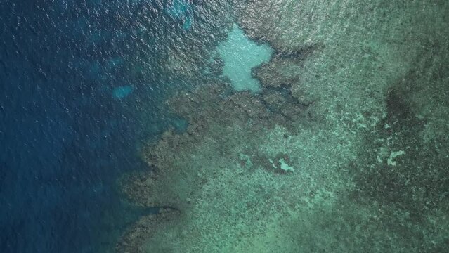 The world's largest coral reef ecosystem The World Heritage Great Barrier Reef viewed from above. High drone view