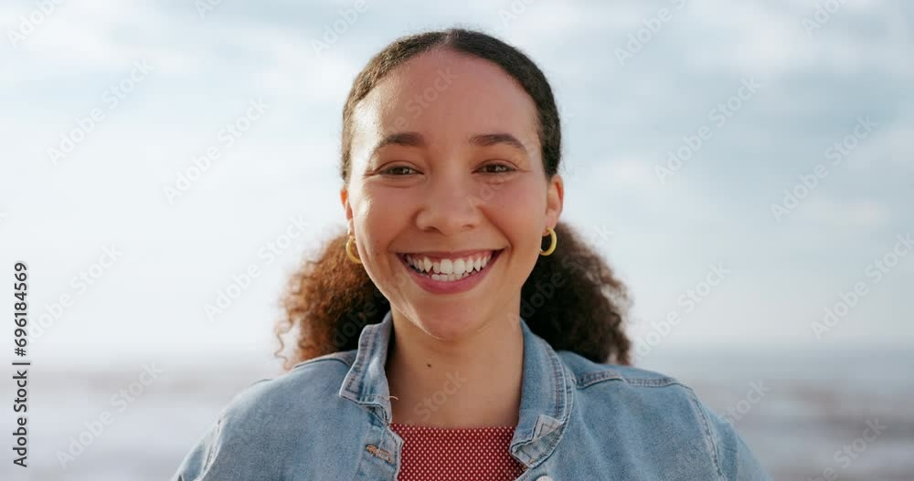 Sticker Face, smile and travel with a woman on beach in summer for vacation, holiday or adventure in Spain. Portrait, relax and a happy young person or tourist at the sea in nature on blue sky background