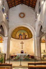 Fototapeta na wymiar The main altar in the main hall of the Saint Josephs Church is located on the territory of Church of the Annunciation in the Nazareth city in northern Israel