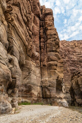 Bizarre  mountain bends at beginning of the Mujib River Canyon hiking trail in Wadi Al Mujib in Jordan