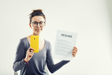 Modern job hunting with resume and smartphone