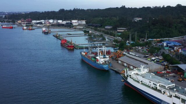 Port City Of Balikpapan And PT Pertamina Oil Refinery Plant In Kalimantan, Indonesia - Aerial Drone Shot