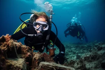 Foto op Plexiglas Scuba diver looking at the wreck of a ship in the Red Sea © igolaizola