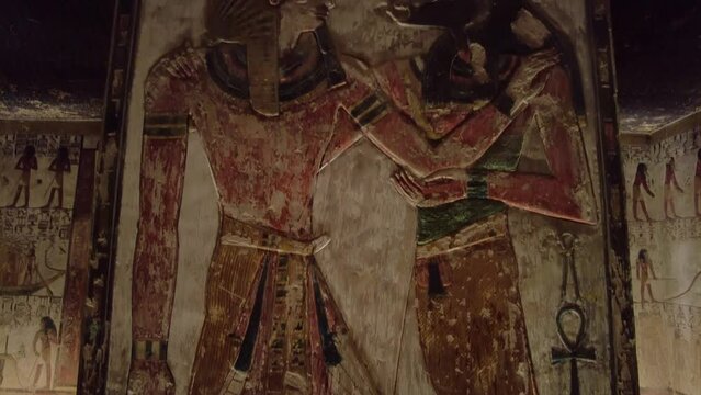 Luxor, Egypt: Interior view of the famous Seti the first tomb that is decorated with gods figures and hieroglyphs  in the valley of Kings in Luxor in Egypt. 