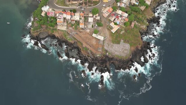 Rugged Coast Of Cidade Velha Town On The Island of Santiago, Cape Verde. Aerial Tilt-up Shot