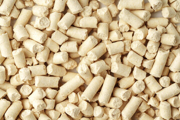 Wooden filler for cat litter close up for background