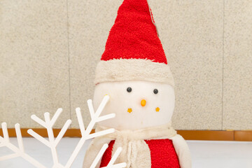a cute snowman in the indoor at horizontal composition
