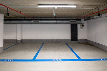 modern interior park white with blue line number of car parking level