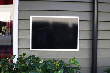 blank sign mockup template with wooden background and flowers