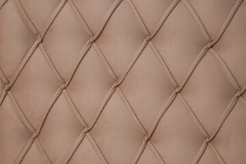 Furniture fabric close up. Image of velvet sofa texture surface.