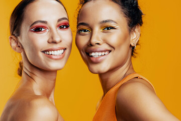 Model woman race happy studio mixed beauty make-up two together skin colorful