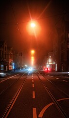 traffic in a foggy night near Frankfurt, Germany. Foggy night in European with colorful street light