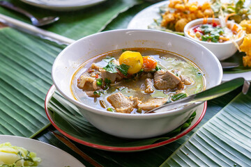 Jackfruit Curry,Northern Thai Food, Curry young jackfruit with fresh small tomato and green veggie,Jackfruit curry, local food in northern Thailand