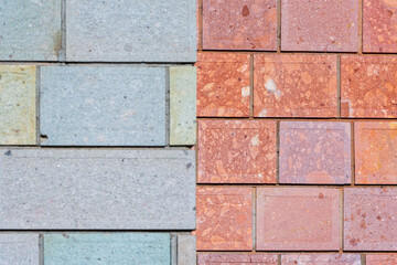 Two worlds , concept. Green and orange colors. Stone wall background. Pattern and texture.