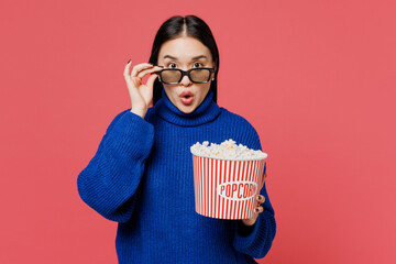 Young shocked amazed woman of Asian ethnicity she wear blue sweater casual clothes lower 3d glasses...