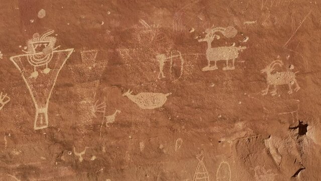 Panning view of the rock art at Sego Canyon petroglyphs near Thompson Springs, Utah.