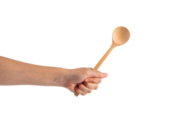 Wooden spoon in hand on transparent background.