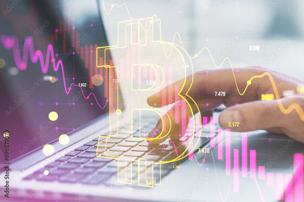 Aufkleber close up of hand using laptop with falling candlestick forex chart and bitcoin on blurry background.