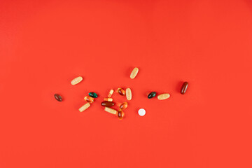 Color Pill Capsules on Color Background, Analgesic Pile, Transparent Painkiller Drugs Mix, Sedative...