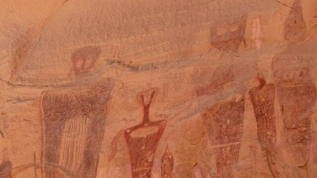 Panning view of the rock art at Sego Canyon petroglyphs near Thompson Springs, Utah.