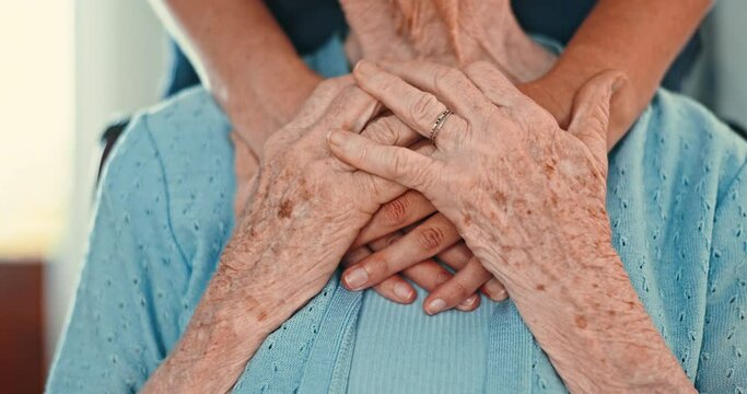 Empathy, hands and closeup of nurse with senior woman in nursing home for assisted living, care or help. Kindness, support or zoom on volunteer with old lady in retirement facility with understanding