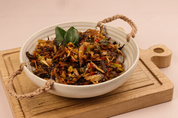 Cakalang Fufu Rabe Rica is Minahasan Traditional Food Made From Shredded Smoked Cakalang (Skipjack Tuna) with Crushed Red Chili Pepper.