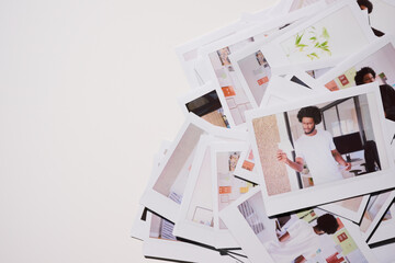 Creative Workflow Exploration.A haphazard pile of Polaroid photos illustrates a man's journey through a productive day, from focused task management to casual brainstorming in a modern office