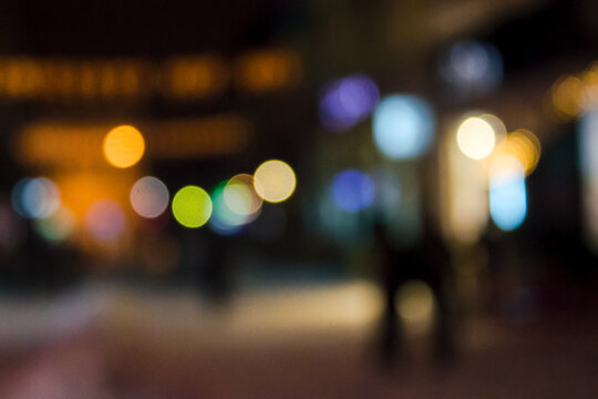town streets at night. winter holiday season blurry background. bokeh effect
