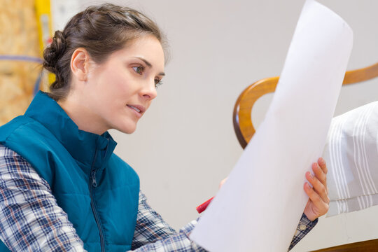 woman reading upholster instructions