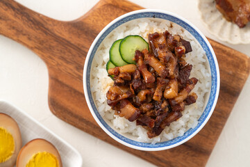 Braised pork belly meat over cooked rice, famous and delicious street food in Taiwanese restaurant.