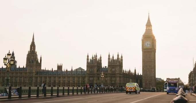 Cinematic landscape shot of London's famous attractions Big Ben and House of Lords in beautiful sunlight.