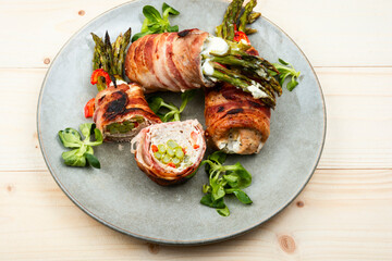 Beef meat rolls with young asparagus.