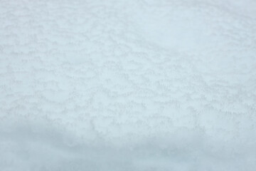 fluffy snow cover after heavy snowfall, snowy winter background
