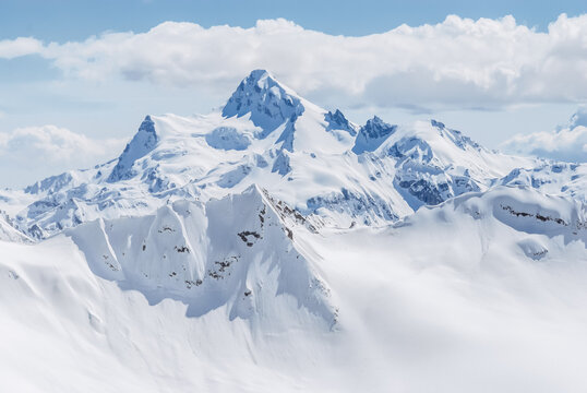 Snowy mountains. Beautiful landscape with snowy rocks. View from the top of Mount Elbrus