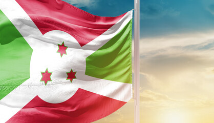 Waving flag of Burundi in beautiful sky. Flag for independence day - Image