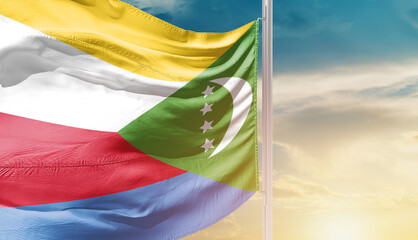 Waving flag of Comoros in beautiful sky. Flag for independence day - Image
