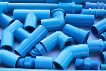 Blue pvc pipe connections for plumbing work. Plumber equipment