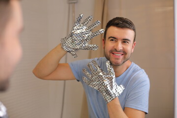 Man using a hydrating therapy mask for his hands