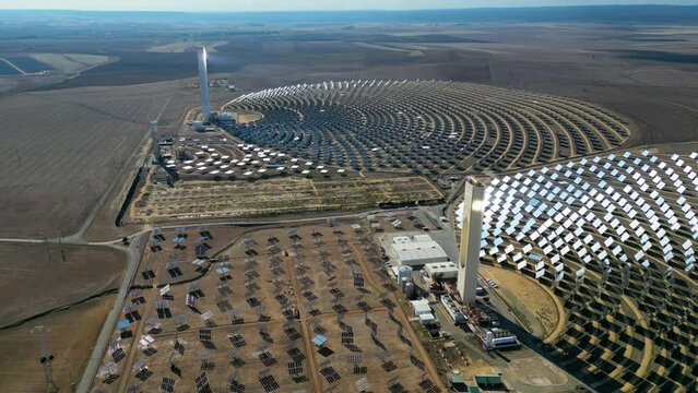 Aerial view of the Solar Power Towers PS10 and PS20 in Sanl&uacute;car la Mayor, Seville. Spain's stunning solar energy plant.  Concentrated solar power plant. Renewable energy. Green energy.