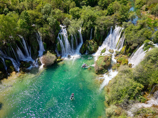 Aerial view of Kravica Waterfall in Bosnia and Herzegovina. The Kravica waterfall is a pearl of the Herzegovinian landscape. It is a unique natural beauty in the Trebizat River. Oasis in stone.