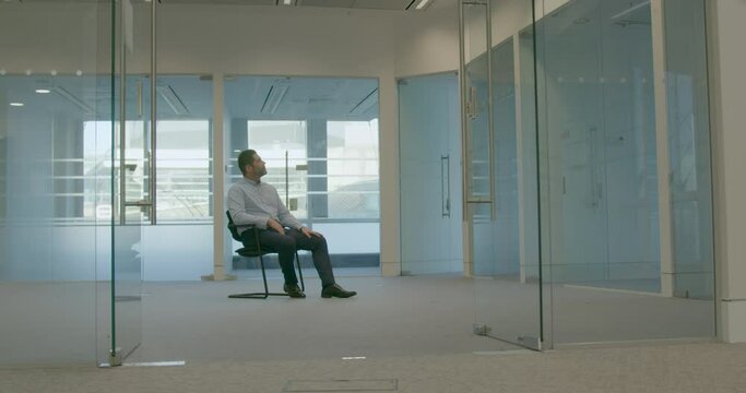 Entrepreneur Sitting Alone in Empty Modern Office