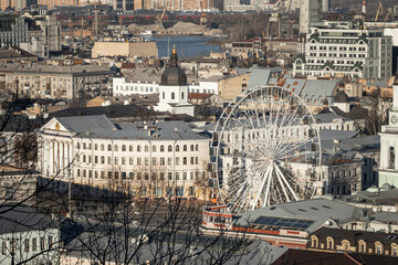 Kyiv, Ukraine - December 20, 2023: a bird's-eye view of the Podilsky district of Kyiv. You can see the beautiful architecture and the Ferris wheel