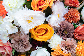 Close-up of colorful artificial flowers for decoration, full frame, background, wallpape
