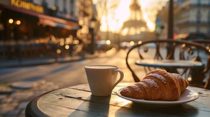 Fotobehang Petit déjeuner parisien, café crème et croissants sur la table en terrasse d'un bistrot typique au petit matin © Sébastien Jouve